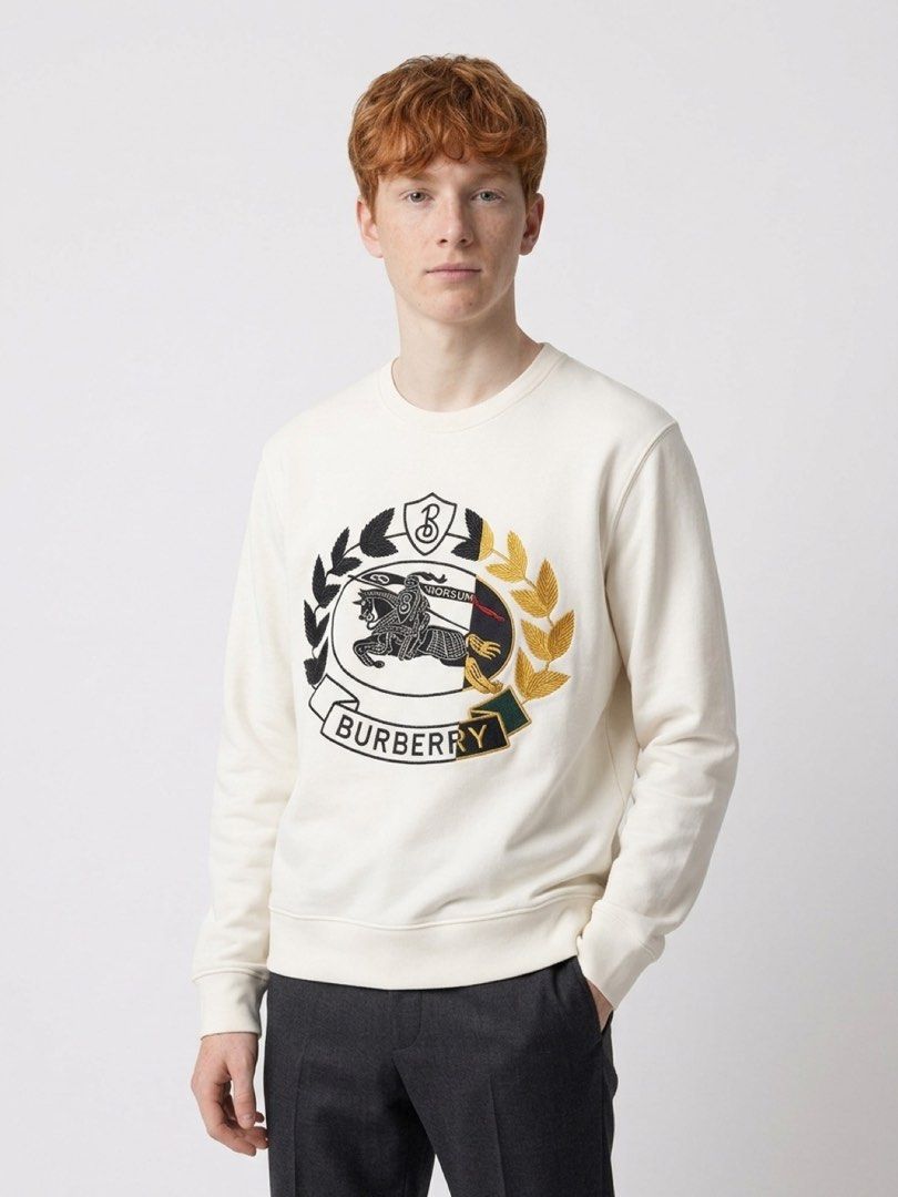 BURBERRY WHITE EMBROIDERED CREST SWEATSHIRT (Category: Luxury Apparel) located in Dagupan City. Submitted by size.spectrum (Listing ID 1470004858, Image 1). Description: SMALL MENS MEDIUM WOMENS EXCELLENT USED SEE PICS FOR DETAILS AND MEASUREMENT.