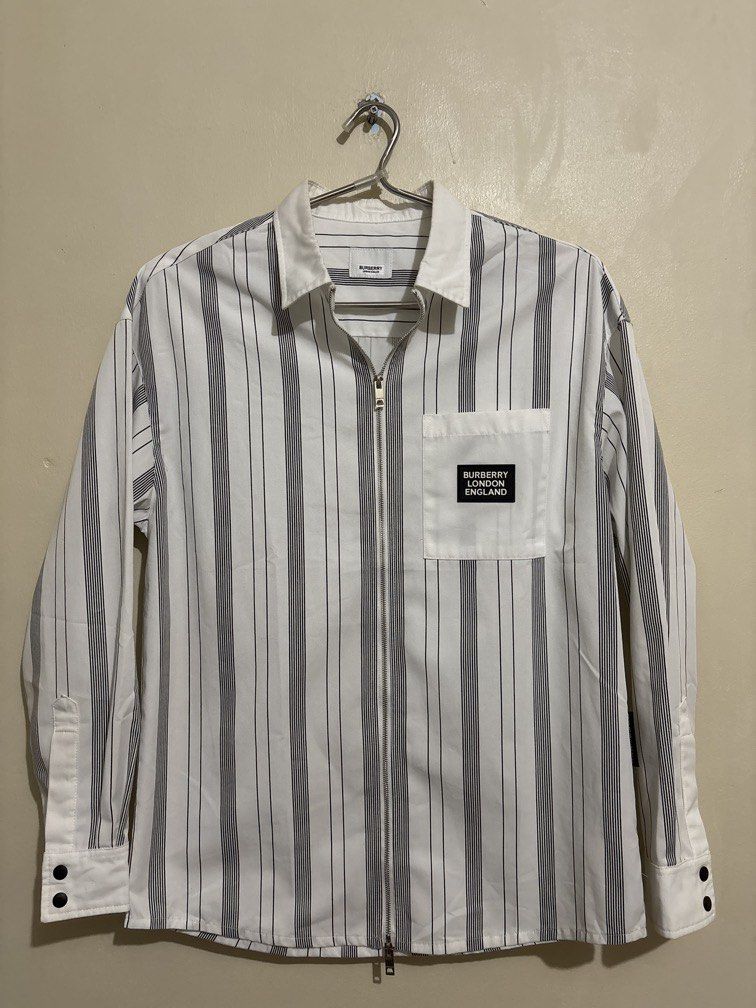 Burberry Zip up Longsleeves (Category: Coats, Jackets and Outerwear) located in Muntinlupa City. Submitted by owrayttttt (Listing ID 1470124327, Image 1). Description: - Burberry Zip up Longsleeves - Dimes is 21x28 - Complete tags - No issue - Free shipping via j&t.
