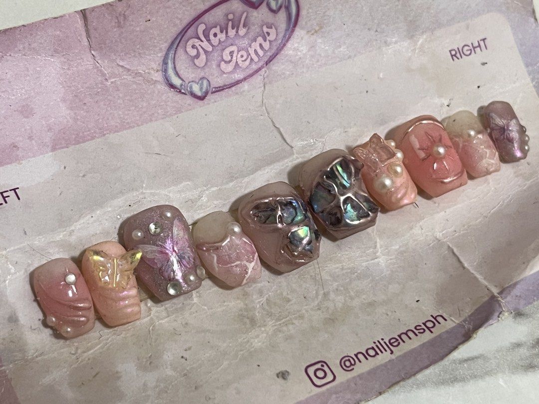 Butterfly Rhinestone Press On Nails (Customized by Nail Jems) (Category: Hands & Nails) located in Quezon City. Submitted by pinkvanilla.milkshake (Listing ID 1470083492, Image 3). Description: Hindi ko na alam sukat neto haha Hindi ko trip ung shape Nadumihan na ung lalagyan Never used S.