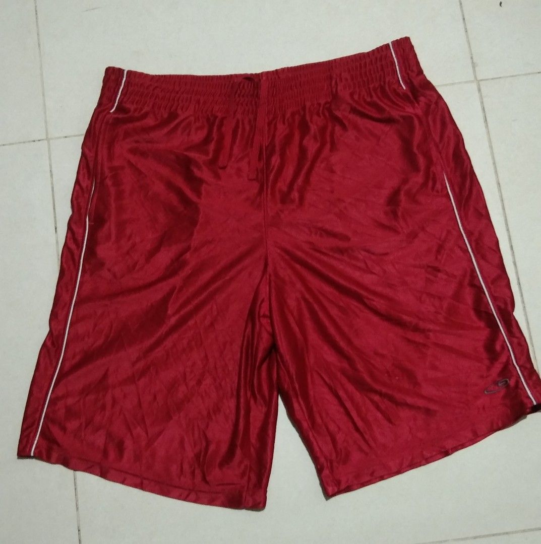 C9 by Champion Red Athletic Shorts XL (Category: Shorts) located in Manila. Submitted by aj.bermundo (Listing ID 1470020239, Image 1). Description: - Brand: C9 by Champion - Size: XL - Color: Red with white piping details - Material: Shiny polyester - Waistband: Elastic with inner drawstring - Features: Embroidered C9 logo near the bottom hem - Origin: Made in the Philippines.