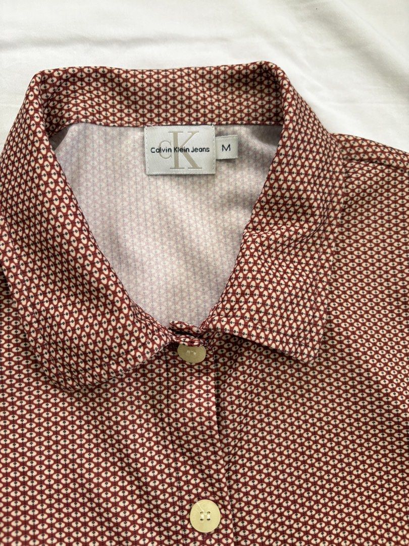 Calvin Klein Jeans Top (Category: Shirts) located in Muntinlupa City. Submitted by jane226ph (Listing ID 1470134664, Image 3). Description: Original Button up shirt Color Red Lightweight Purchased in-store Sold as-is.
