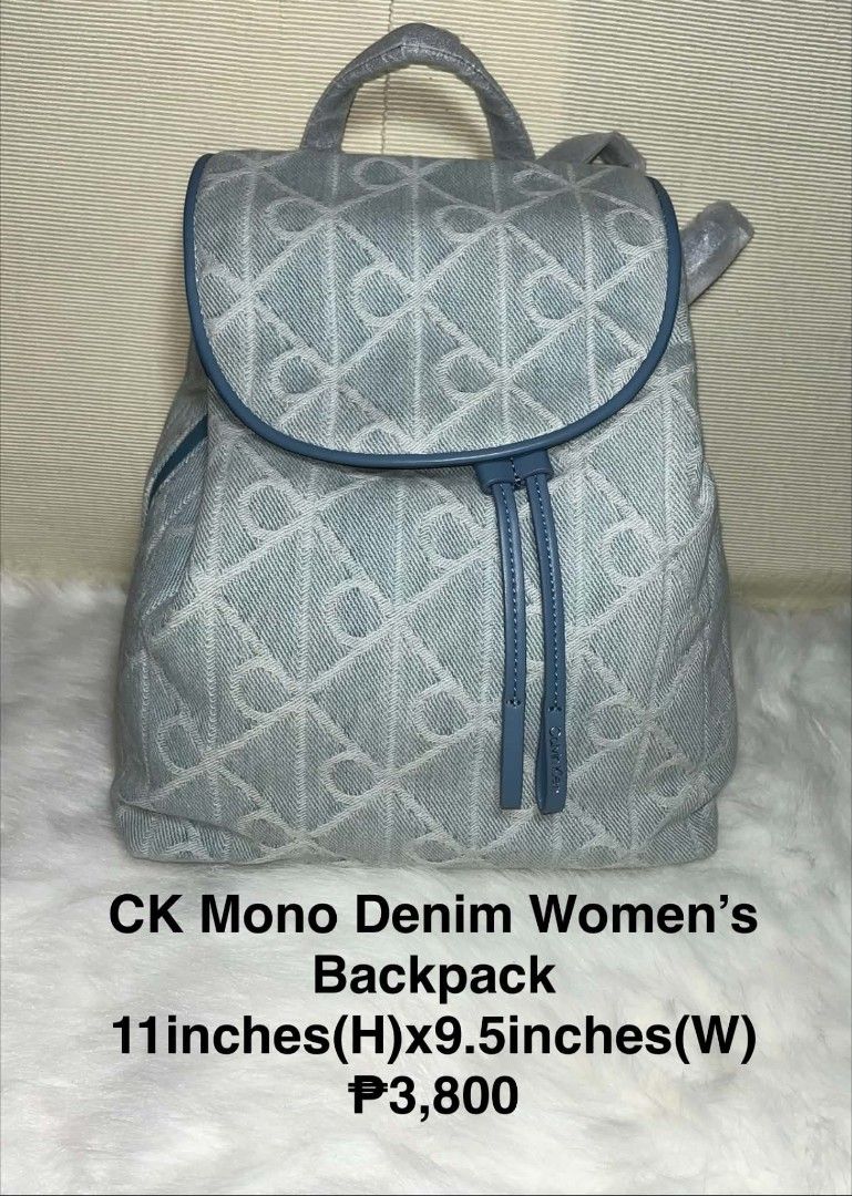 Calvin Klein Mono Denim Women's Backpack (Category: Backpacks) located in Imus. Submitted by maria_pilayo (Listing ID 1469970730, Image 1). Description: - Brand: Calvin Klein - 💯% Authentic - Style: Mono denim backpack with blue leather trim - Color: Light blue monogram - Closure: Drawstring - Dimensions: 11 inches (H) x 9.5 inches (W) - Condition: Brand new, straps and handle still in original protective packaging - 100% authentic and ready to 