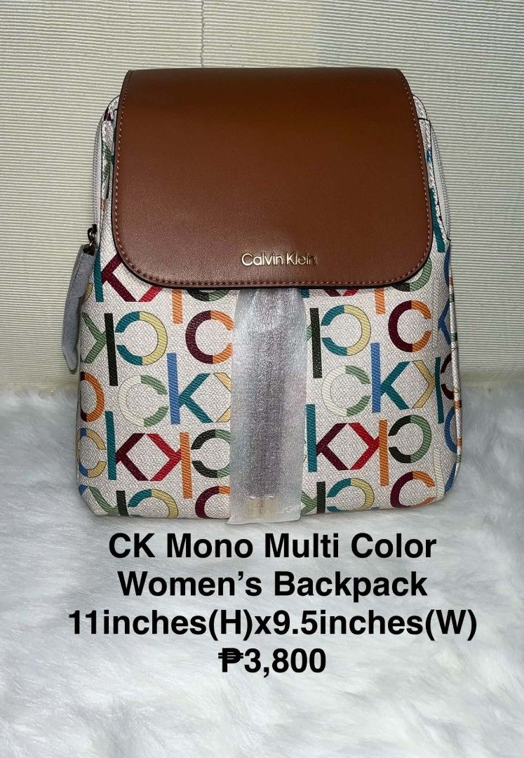 Calvin Klein Mono Multi Color Women's Backpack (Category: Backpacks) located in Imus. Submitted by maria_pilayo (Listing ID 1469970384, Image 1). Description: - Brand: Calvin Klein - 💯% Authentic - Condition: Brand new, unused, still wrapped in protective factory packaging - Design: Mono multi-color print with brown top flap and straps - Branding: Calvin Klein metallic lettering on the front - Features: Adjustable brown logo-printed backpack str