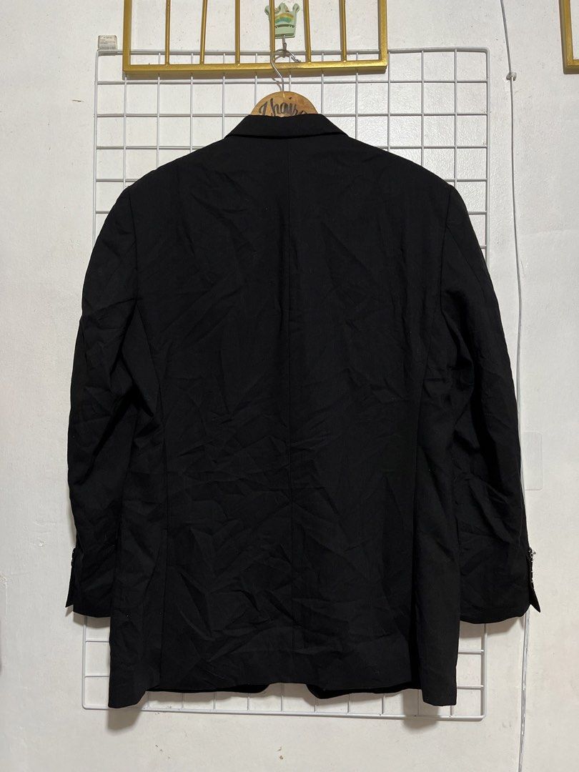 Calvin Klein Pure New Wool Black Blazer Jacket - M (Category: Coats, Jackets and Outerwear) located in Pagsanjan. Submitted by zhairaaaaa (Listing ID 1470092198, Image 3). Description: 🖤 CALVIN KLEIN PURE NEW WOOL SUIT JACKET ✨ 100% Pure New Wool ✨ Woolmark certification label ✨ Classic 3-button front closure ✨ Timeless notched lapels ✨ Two front flap pockets ✨ Chest welt pocket ✨ Perfect for formal events, office & smart outfits 🏷️ Size Medium