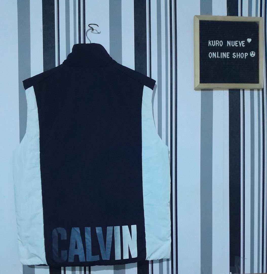 Calvin klein vest / Waterproof (Category: Coats, Jackets and Outerwear) located in Lucena. Submitted by kuronueve0909 (Listing ID 1470064063, Image 3). Description: Calvin klein vest Waterproof Size: XL Width: 23.5 Length: 27.5 Price: ₱1,350 No issue ✅️ Ready to wear ✅️.