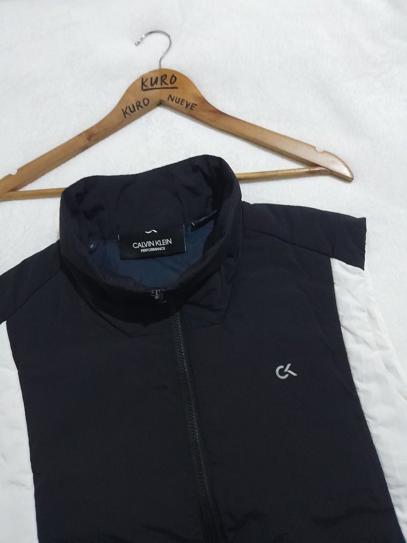 Calvin klein vest / Waterproof (Category: Coats, Jackets and Outerwear) located in Lucena. Submitted by kuronueve0909 (Listing ID 1470064063, Image 2). Description: Calvin klein vest Waterproof Size: XL Width: 23.5 Length: 27.5 Price: ₱1,350 No issue ✅️ Ready to wear ✅️.