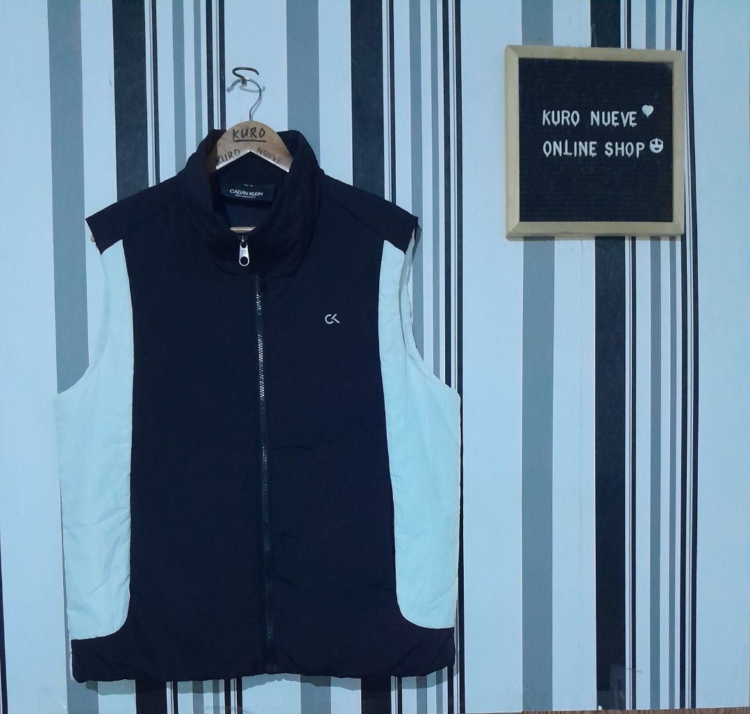 Calvin klein vest / Waterproof (Category: Coats, Jackets and Outerwear) located in Lucena. Submitted by kuronueve0909 (Listing ID 1470064063, Image 1). Description: Calvin klein vest Waterproof Size: XL Width: 23.5 Length: 27.5 Price: ₱1,350 No issue ✅️ Ready to wear ✅️.