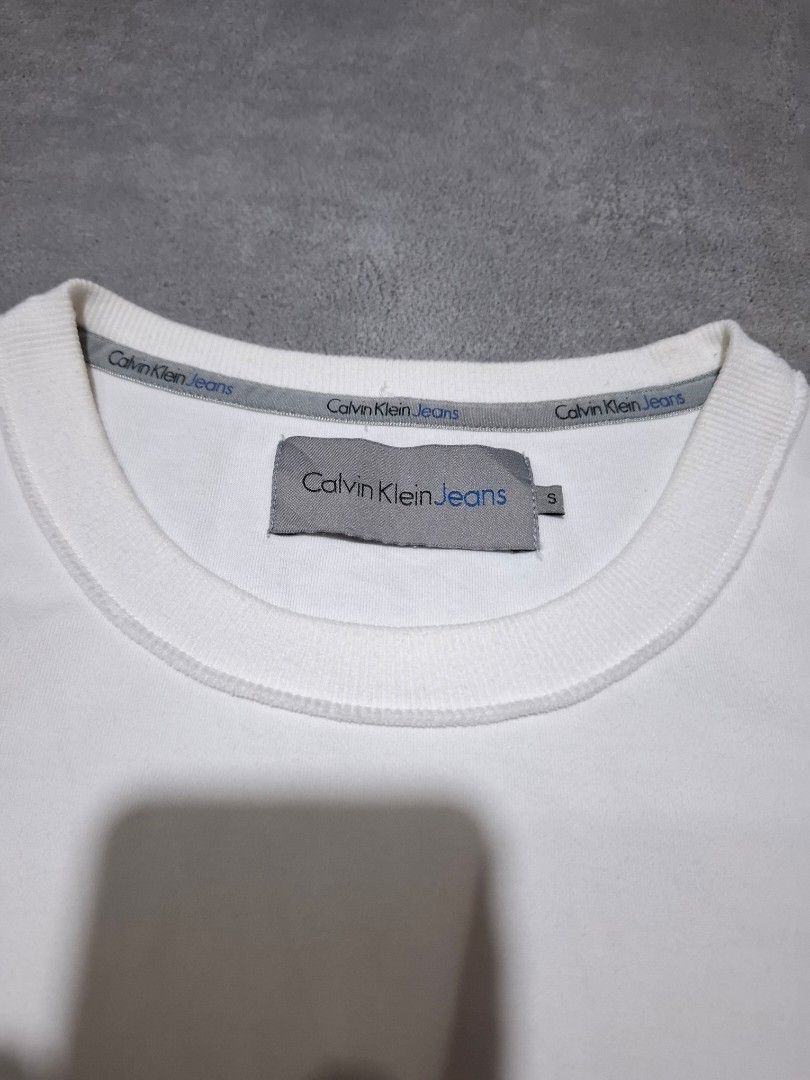 Calvin Klein (White Women's) (Category: Activewear) located in Rizal. Submitted by marcothrifts (Listing ID 1470084664, Image 3). Description: Calvin Klein (White Women's) S on tag Width: 18.5 Length: 24 Color rate: 9.9/10 Excellent Condition No issue.