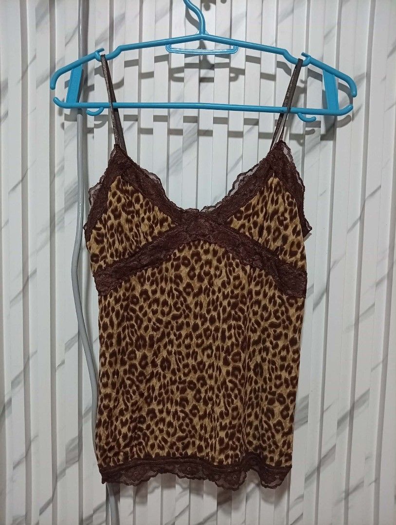 Camisole tank tops brown Leopard (Category: Others Tops) located in Barotac Nuevo. Submitted by john.pritz (Listing ID 1470048494, Image 1). Description: Camisole tank tops brown leopard like new condi no issue Width 13 to stretch 16 Length 21.