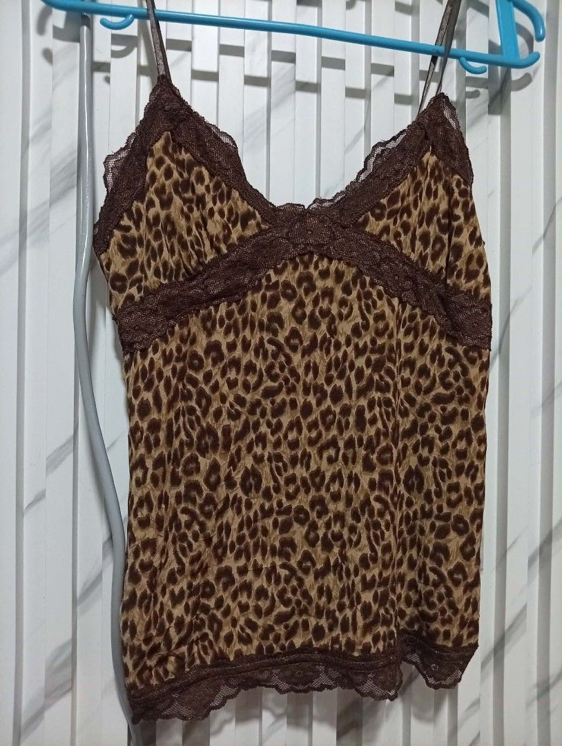 Camisole tank tops brown Leopard (Category: Others Tops) located in Barotac Nuevo. Submitted by john.pritz (Listing ID 1470048494, Image 2). Description: Camisole tank tops brown leopard like new condi no issue Width 13 to stretch 16 Length 21.