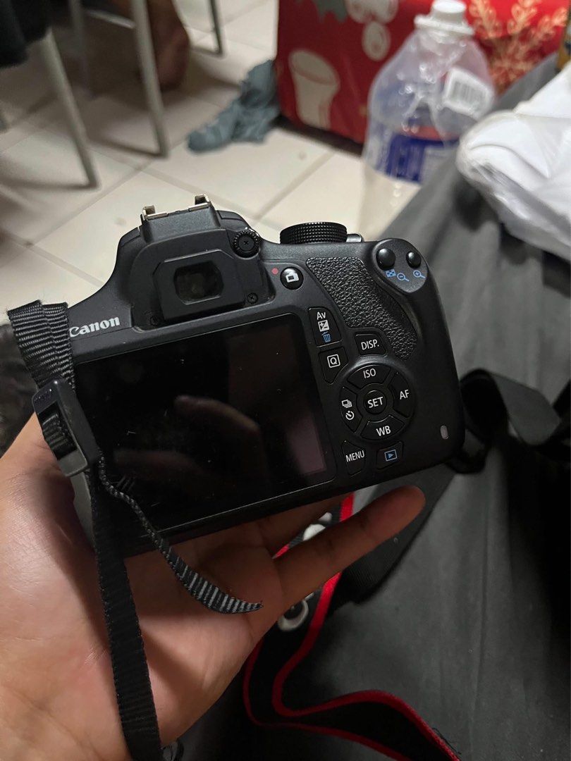 Canon EOS 1200D DSLR Camera with 18-55mm Lens (Category: Cameras) located in Taguig. Submitted by jhnphi (Listing ID 1470098966, Image 1). Description: - Model: Canon EOS 1200D DSLR Camera Body (Black) - Lens: 18-55mm Image Stabilizer (IS) Lens - Included Accessories: Standard neck strap and lens cap, battery, and charger - Condition: good working condition, standard buttons, and vignette LCD screen - Ideal for: Aspiring photographers and hobbyis