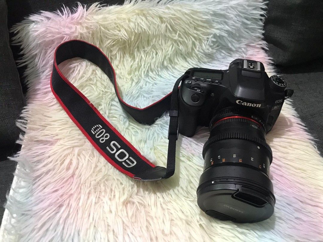 Canon EOS 80D DSLR Camera with Lens and Accessories (Category: Cameras) located in Marilao. Submitted by appleanne56789-08626 (Listing ID 1470001080, Image 3). Description: - Canon EOS 80D DSLR camera body with Samyang lens - Includes 2 rechargeable batteries, charger, and power cord - Comes with a branded neck strap - Fully articulating LCD screen that flips out smoothly - All buttons, dials, and ports are clean and intact - Plug-and-play ready 