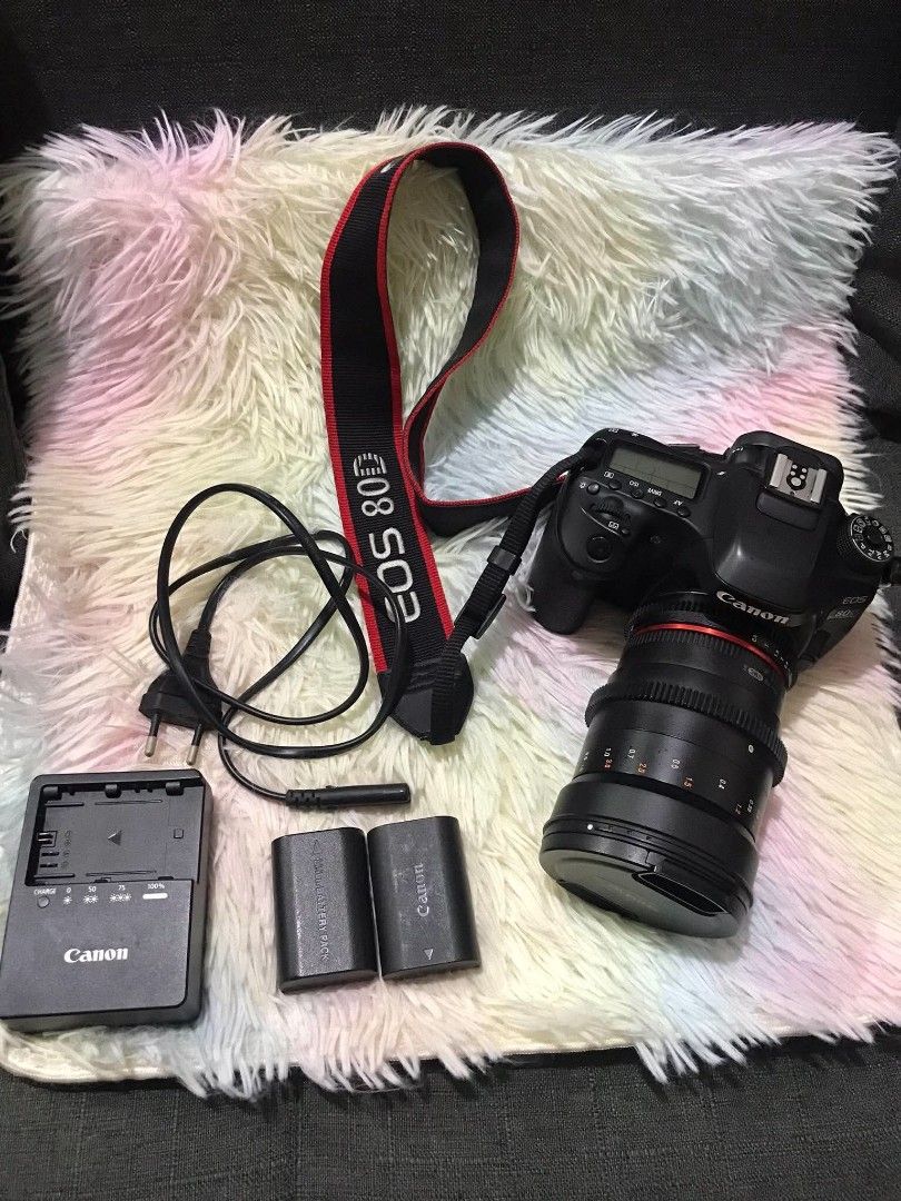 Canon EOS 80D DSLR Camera with Lens and Accessories (Category: Cameras) located in Marilao. Submitted by appleanne56789-08626 (Listing ID 1470001080, Image 1). Description: - Canon EOS 80D DSLR camera body with Samyang lens - Includes 2 rechargeable batteries, charger, and power cord - Comes with a branded neck strap - Fully articulating LCD screen that flips out smoothly - All buttons, dials, and ports are clean and intact - Plug-and-play ready 