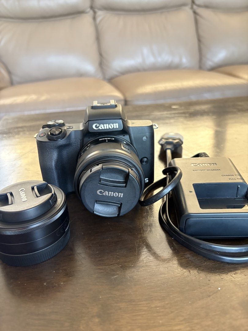 Canon EOS M50 with free additional lens (Category: Cameras) located in Manila. Submitted by tricia.gal (Listing ID 1469977505, Image 1). Description: FOR SALE: Canon EOS M50 (Black) 📸 * Purchased in 2021 * Excellent condition * 24.1MP mirrorless camera * 4K video recording * Flip-out touchscreen * Lenses included: * Canon EF-M 15–45mm f/3.5–6.3 IS STM * Canon EF-M 22mm f/2 STM * Great for travel, portraits, and content creation RFS: Looking for 