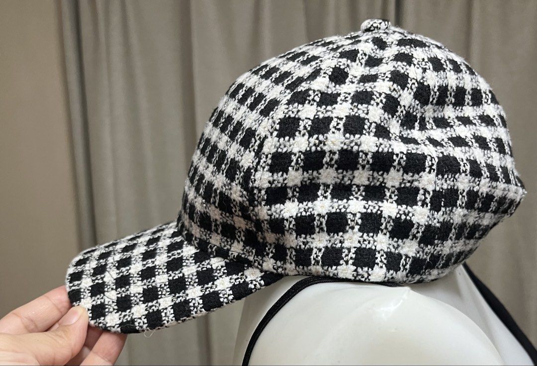 Cap unisex (Category: Hats & Beanies) located in Bacoor. Submitted by ayit. (Listing ID 1470060813, Image 2). Description: 300 each new sf inc - Style: Unisex baseball cap - Color: Black and white - Pattern: Classic checkered / houndstooth - Material: Textured woven tweed fabric with subtle metallic shimmer - Closure: Adjustable strap with metal buckle at the back for a custom fit - Condition: Excellent / gently used - Perfect for daily casual we