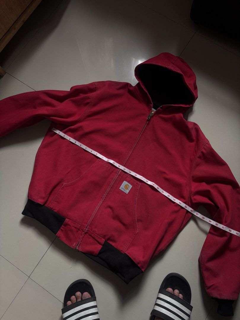 Carousell Carhartt Red Active Jacket Hooded Workwear (Category: Coats, Jackets and Outerwear) located in Manila. Submitted by analyt1cs (Listing ID 1469999276, Image 1). Description: J03 red 26x26 pit to pit issue: missing hood lace and faded tags 15k asking or obo.