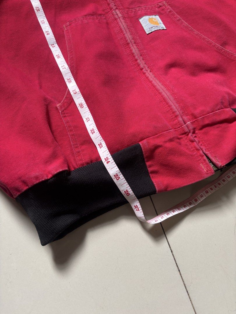 Carousell Carhartt Red Active Jacket Hooded Workwear (Category: Coats, Jackets and Outerwear) located in Manila. Submitted by analyt1cs (Listing ID 1469999276, Image 3). Description: J03 red 26x26 pit to pit issue: missing hood lace and faded tags 15k asking or obo.