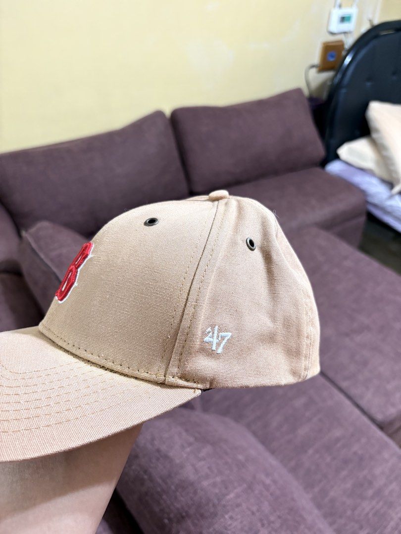 Carousell X '47 Boston Red Sox Cap (Category: Caps & Hats) located in Manila. Submitted by breezy09breezy (Listing ID 1469988712, Image 2). Description: - Official Carousell x '47 Brand collaboration cap - Color: Tan canvas with red Boston Red Sox 'B' logo - Side embroidery featuring the '47 logo - Adjustable strapback closure with Carousell text label - Interior details include co-branded tag, printed taped seams, and brim hologram sticker - Con