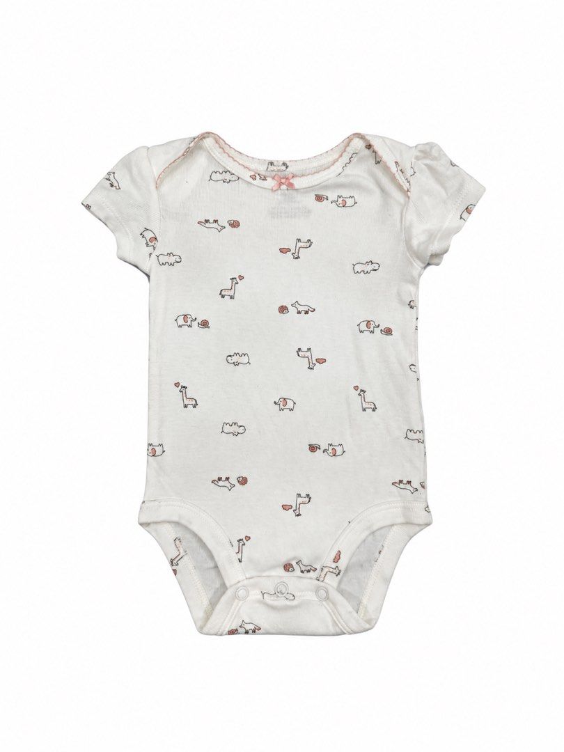 Carter’s Onesie (3M) (Category: Babies & Kids Fashion) located in Angeles City. Submitted by aeapreloved (Listing ID 1469983299, Image 1). Description: Carter’s Baby Animal Print Bodysuit 🐘🦒🎀 • Size: 3 months • Cream/ivory with cute animal prints and pink accents • Soft, comfortable fabric • Short sleeves with pink neckline trim • Cute pink bow detail • 3 snap-button closure for easy diaper changes.