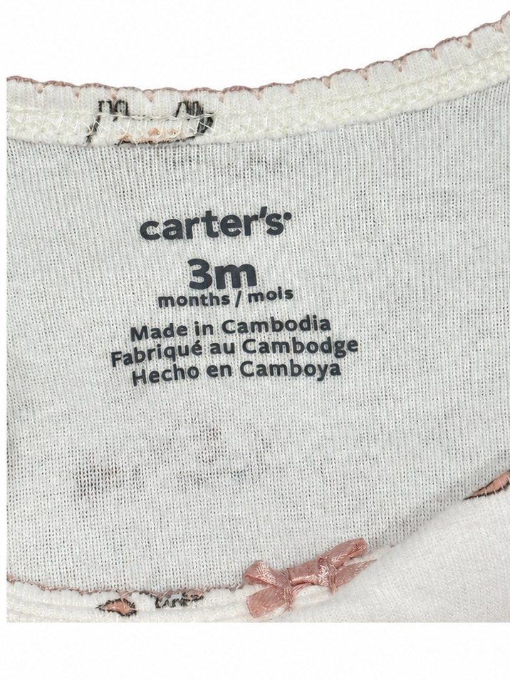 Carter’s Onesie (3M) (Category: Babies & Kids Fashion) located in Angeles City. Submitted by aeapreloved (Listing ID 1469983299, Image 2). Description: Carter’s Baby Animal Print Bodysuit 🐘🦒🎀 • Size: 3 months • Cream/ivory with cute animal prints and pink accents • Soft, comfortable fabric • Short sleeves with pink neckline trim • Cute pink bow detail • 3 snap-button closure for easy diaper changes.