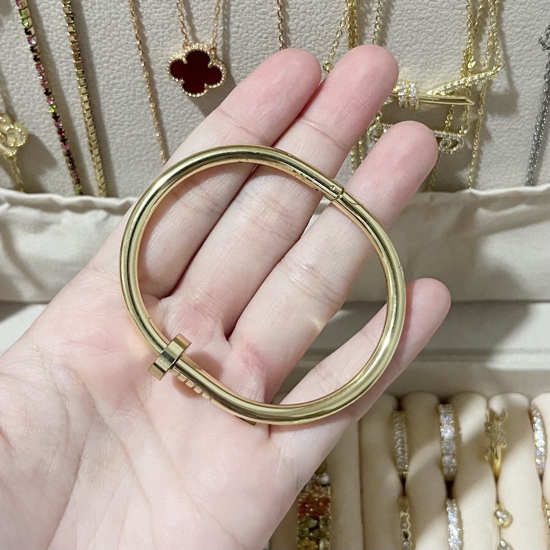 CARTIER NAIL GOLD BANGLE (Category: Bracelets) located in Talavera. Submitted by curatedbykhy (Listing ID 1470077000, Image 2). Description: gandaaa ng color! may cartier marking size 15-16cm.