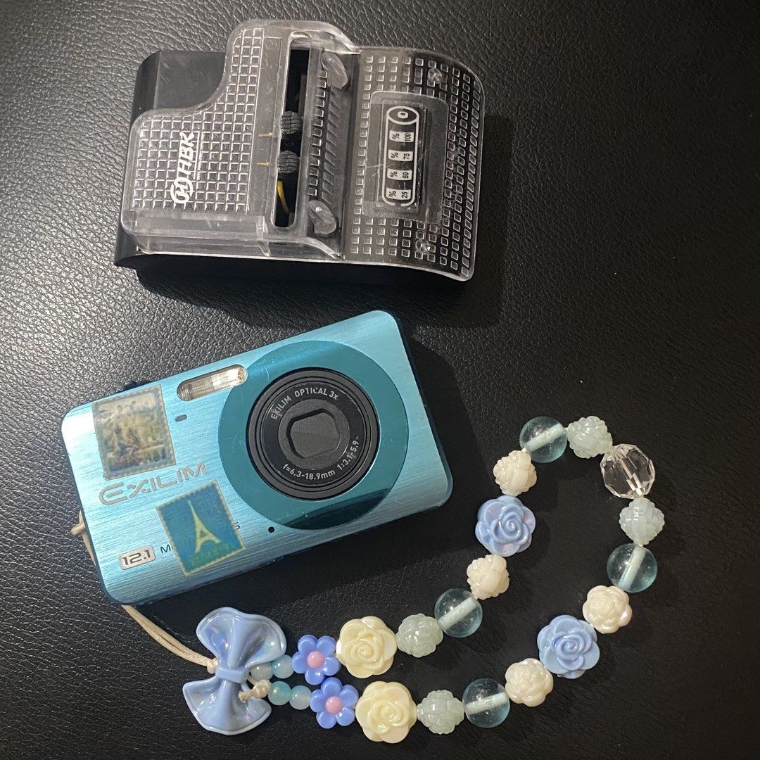 Casio Exilim EX-Z90 Digital Camera in blue (Category: Cameras) located in Cavite. Submitted by daydreamer1898 (Listing ID 1470026963, Image 1). Description: Flash working All buttons working Zoom in and out working Record video working Inclusion: Unit Universal charger Battery Blue beaded lanyard 2gb SD card Rfs: rarely use it.