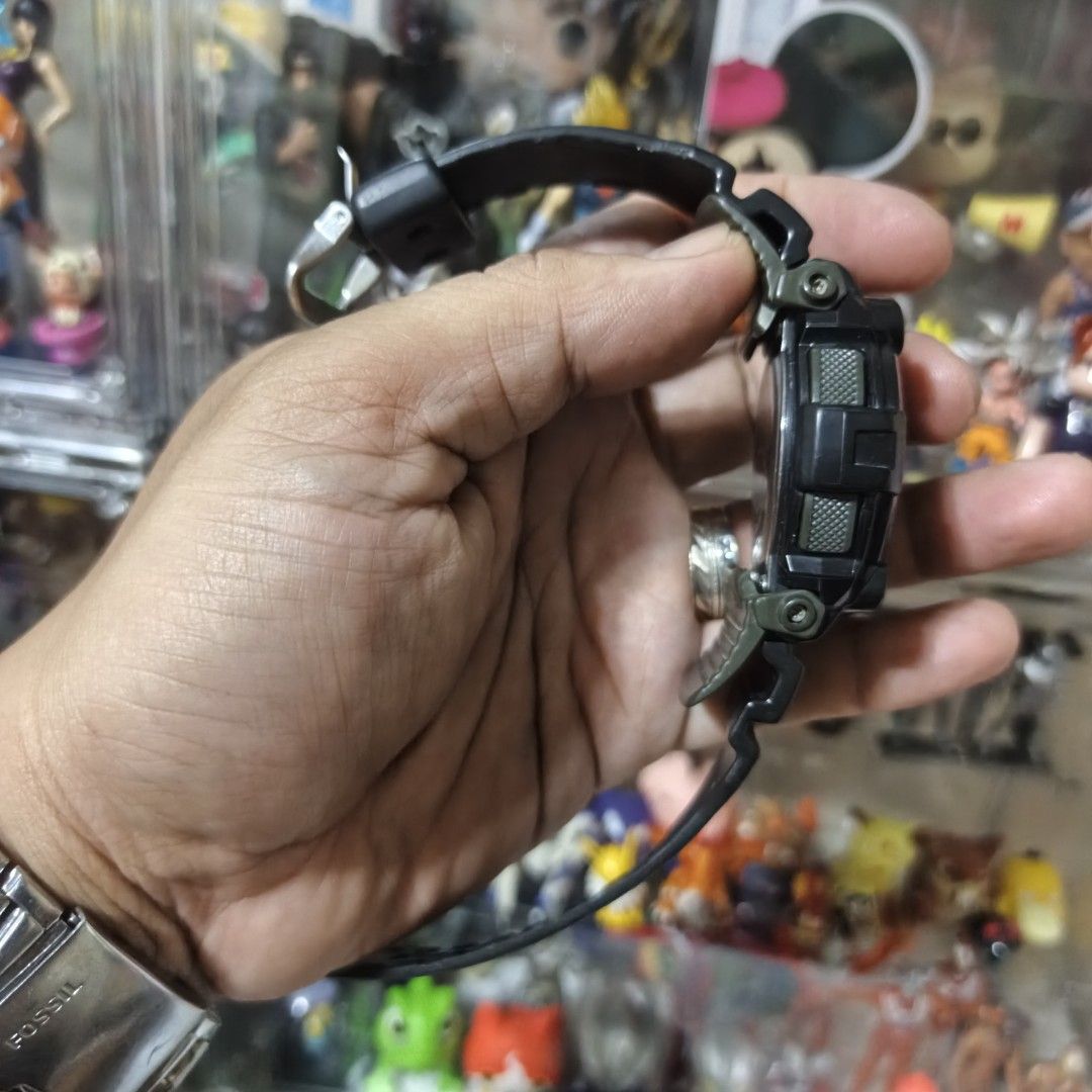 Casio G-Shock G-7900 Digital Watch (Category: Men's Watches) located in Manila. Submitted by narju1234 (Listing ID 1469954646, Image 2). Description: - Model: Casio G-Shock G-7900 (Black resin case and strap) - Durability: Shock-resistant structure with 200M water resistance, built tough for outdoor activities - Features: Digital display, low-temp LCD, moon phase, and tide graph - Design: Distinctive red G button at the bottom and standard buckle