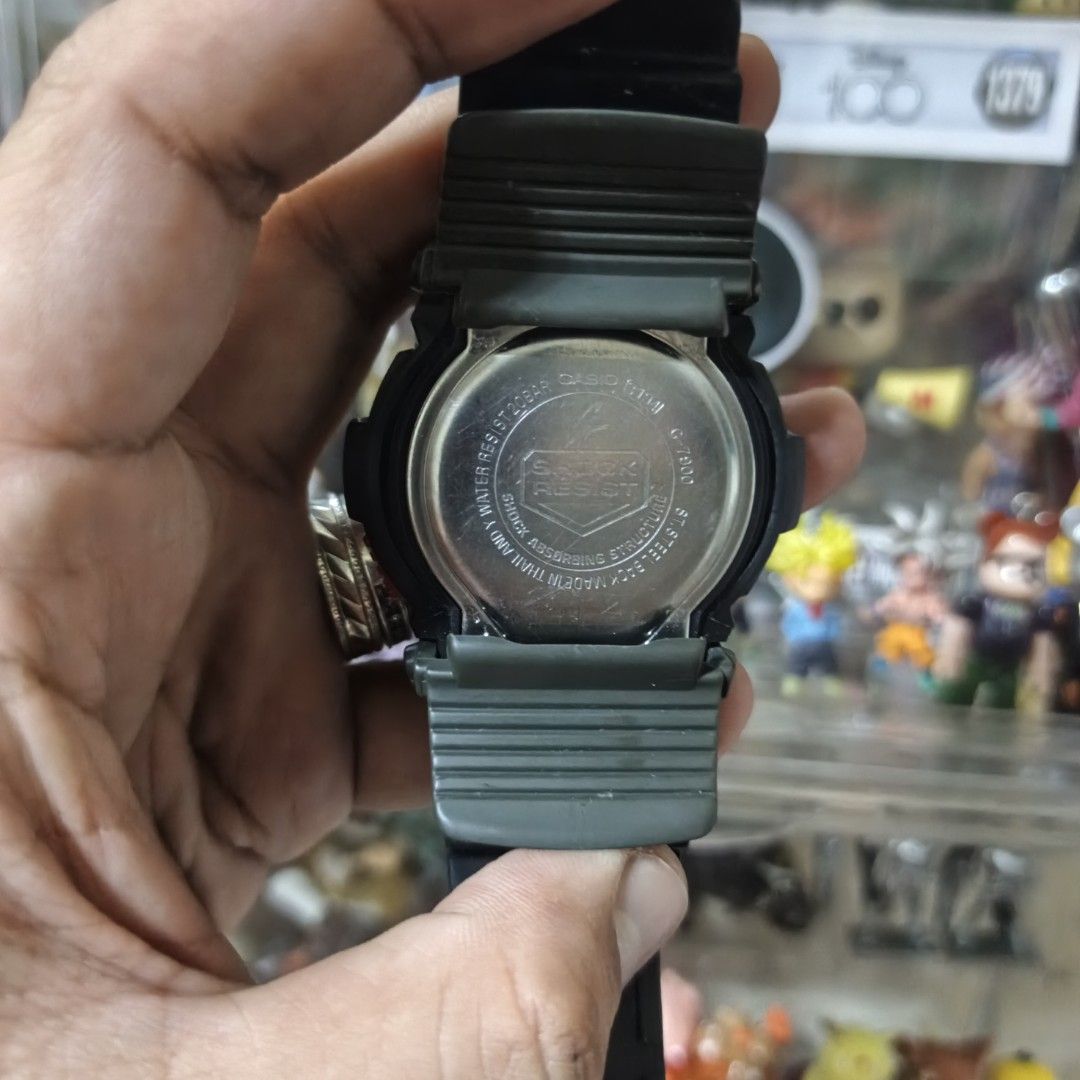 Casio G-Shock G-7900 Digital Watch (Category: Men's Watches) located in Manila. Submitted by narju1234 (Listing ID 1469954646, Image 3). Description: - Model: Casio G-Shock G-7900 (Black resin case and strap) - Durability: Shock-resistant structure with 200M water resistance, built tough for outdoor activities - Features: Digital display, low-temp LCD, moon phase, and tide graph - Design: Distinctive red G button at the bottom and standard buckle
