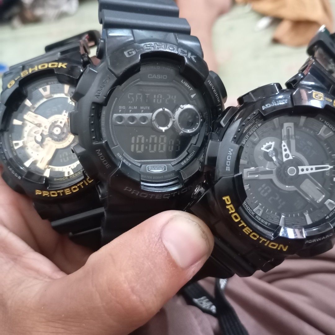 Casio G-Shock Watches (Category: Men's Watches) located in Manila. Submitted by jhonevanma58082 (Listing ID 1469959548, Image 1). Description: ‼️FOR SALE‼️G-SHOCK LEGIT💯 ₱1500 each NEGOTAIBLE kunti GA-100DW & GA-100GB - replacement strap n bezel,goodrunning condition,all function working,clean glass,presentable. GD-100 - orig BEZEL replacement strap, goodrunning condition,all function working,clean glass,presentable. Comment,Dm nlng sa mga inter