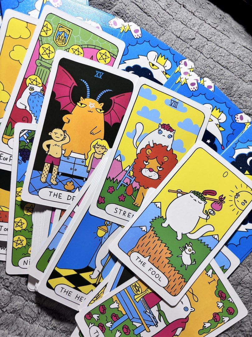 Cat Paws Tarot Deck by Wyspell (Category: Storybooks) located in Mandaluyong City. Submitted by ryoonii (Listing ID 1470058506, Image 2). Description: 350 nalanggg 😻💗 super cute quirky illustrations! great gift idea for cat lovers, pwede rin for fun use and pang display (description below from Wyspell product page) • Unique Cat Tarot Deck: Hand-drawn cat illustrations integrated with traditional tarot symbolism, capturing the essence of each cl