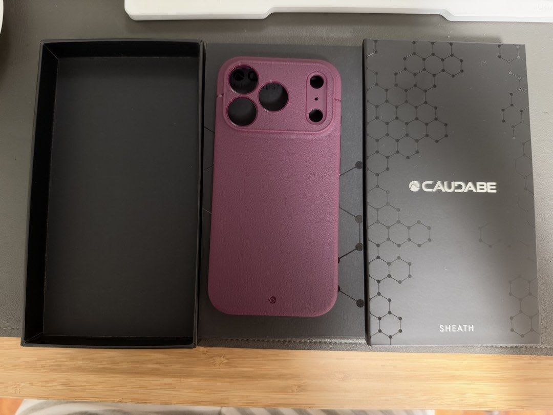 Caudabe Sheath Precise for IPhone 18 Pro (Almandine) (Category: Cases & Sleeves) located in Quezon City. Submitted by freedomsturtle (Listing ID 1470028102, Image 1). Description: - Brand: Caudabe (Sheath Precise) - Compatible Model: iPhone 18 Pro - Color: Almandine (Purple) - Condition: Brand new with original box (extra case from US) - Features: Premium minimalist design, enhanced grip, shock-absorbing inner lining Shipping c/o buyer.