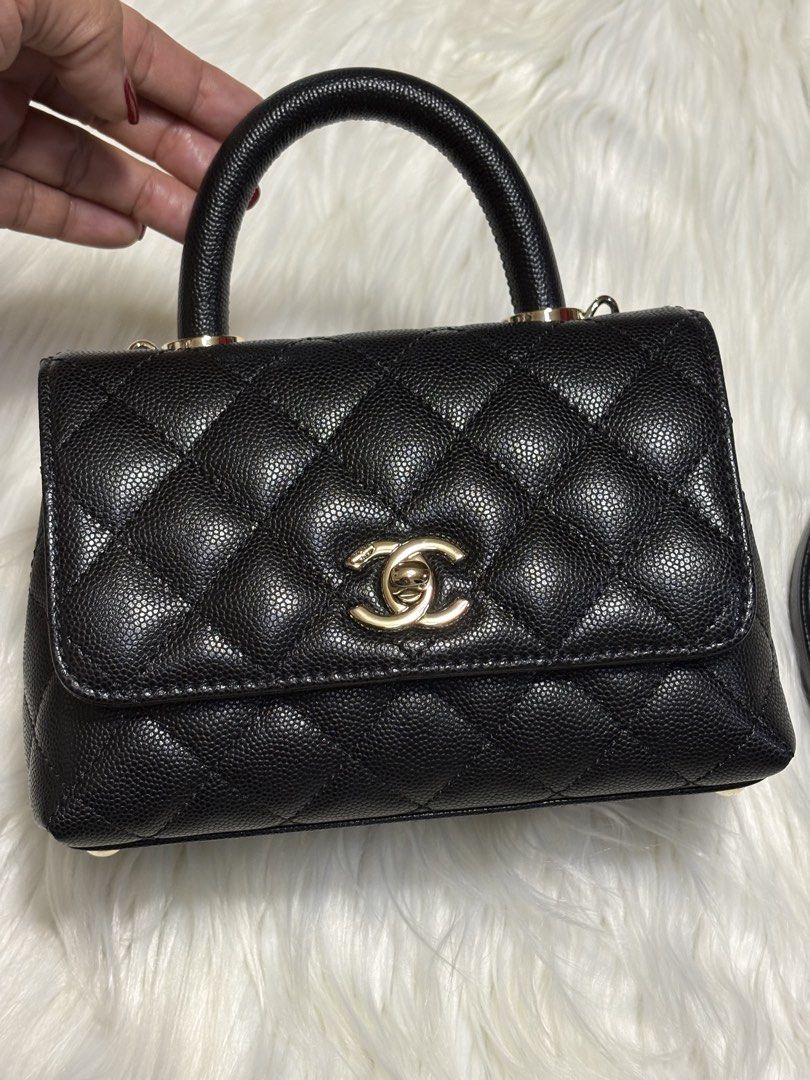 CC Coco Black Caviar Leather Mini Handle Flap Bag (Category: Luxury Bags & Wallets) located in Mandaue City. Submitted by jane2872 (Listing ID 1470058972, Image 1). Description: - Premium black caviar leather with classic quilted diamond pattern - Luxurious silver-tone hardware featuring iconic CC turn-lock closure - Convenient back slip pocket and protective base feet - Includes a detachable leather and chain interwoven strap - Compact everyday 