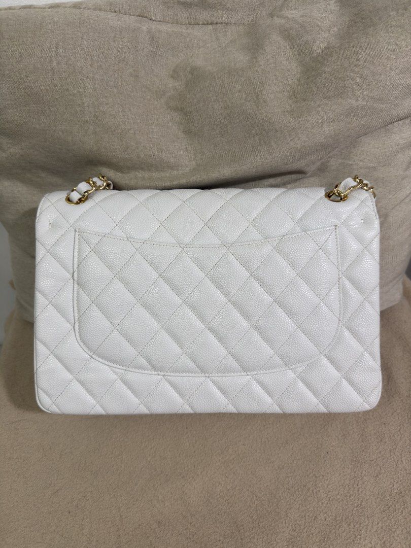 CC Jumbo Classic Caviar Double Flap 30cm (Category: Shoulder Bags) located in Makati City. Submitted by empiricalluxe (Listing ID 1470136523, Image 3). Description: White caviar with gold hardware With dust bag 📍Legazpi Village, Makati I’m on the nightshift so replies may be slow during the daytime Buyers will be responsible for booking and paying for same-day delivery service For buyers in Metro Manila and nearby areas only that are serviceable