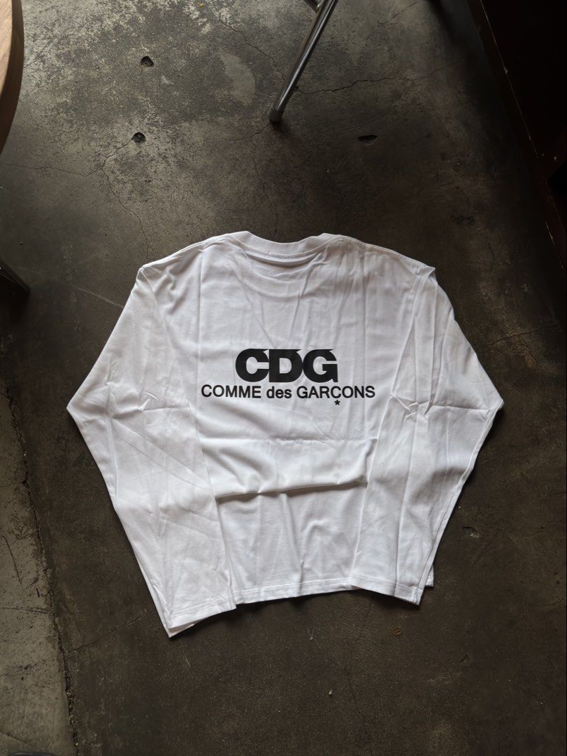 CDG COMME des GARÇONS Sleeves (Category: Sleeveless) located in Manila. Submitted by distinct_mnl (Listing ID 1470119132, Image 2). Description: CDG COMME des GARÇONS SLEEVES Php 1599 S - 22x27.5x2 M - 22.5x28x22.5 L - 23x28.5x23 XL - 23.5x29x23.5.