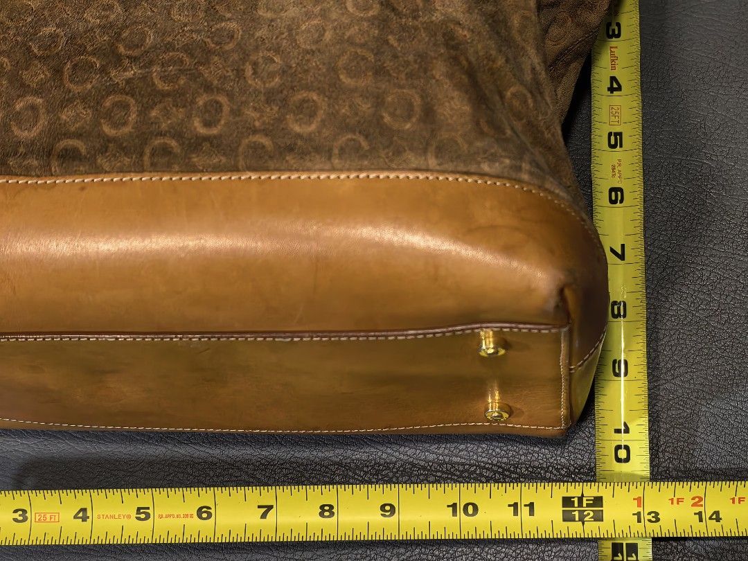 Celine Suede C Initial Pattern Tote Bag Brown Tan (Category: Luxury Bags & Wallets) located in Cagayan de Oro. Submitted by pootx (Listing ID 1470091816, Image 2). Description: -please check the last photo sa issues - Authentic Celine tote bag made in Italy (Serial No: MC00/1) - Brown suede body with signature C monogram pattern and tan leather trim - Dual top handles and protective metal feet on the bottom - Secure top zip closure with branded g