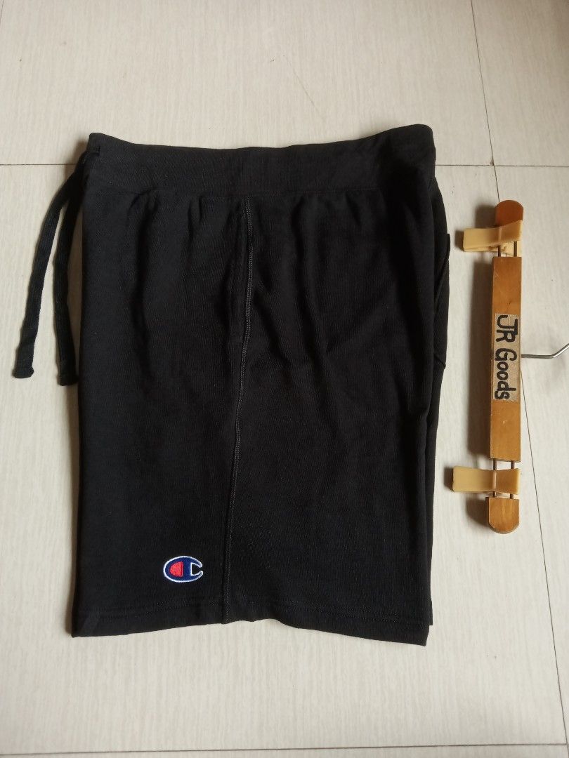 Champion Black Sweatshorts Size M (Category: Shorts) located in Tanay. Submitted by jrgoods (Listing ID 1469979502, Image 1). Description: Champion sweatshort Medium Waistline 32-34 Length 20 Good as new condition 450+ship Tanay Rizal location Shipping Nationwide - Color: Black - Size: Medium (M) - Material: Cotton and polyester blend (Made in Cambodia) - Waistband: Elastic with adjustable drawstrings - Details: Embroidered Champion logo on the l