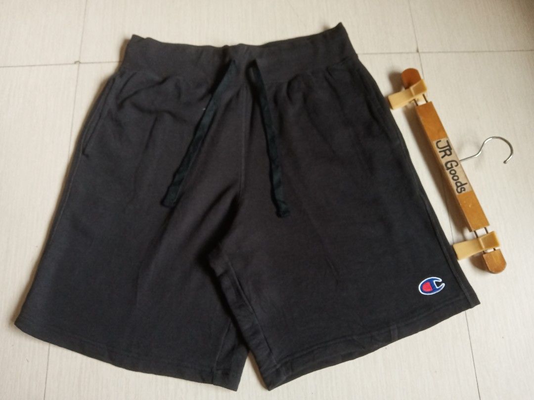 Champion Black Sweatshorts Size M (Category: Shorts) located in Tanay. Submitted by jrgoods (Listing ID 1469979502, Image 3). Description: Champion sweatshort Medium Waistline 32-34 Length 20 Good as new condition 450+ship Tanay Rizal location Shipping Nationwide - Color: Black - Size: Medium (M) - Material: Cotton and polyester blend (Made in Cambodia) - Waistband: Elastic with adjustable drawstrings - Details: Embroidered Champion logo on the l
