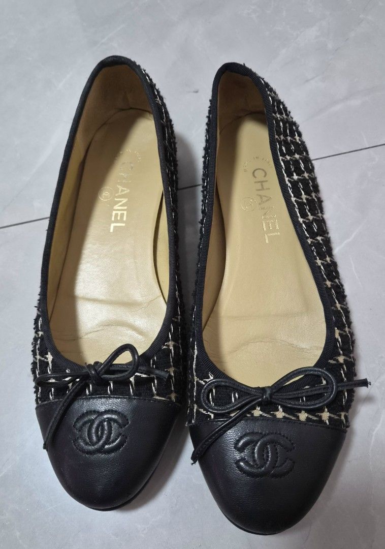 Chanel Black Tweed Cap-Toe Ballet Flats (Category: Flats & Sandals) located in Caloocan City. Submitted by imladris1016 (Listing ID 1469983696, Image 2). Description: - Brand: Chanel - Style: Slip-on flats - Material: Black tweed with checkered pattern and black leather cap toe - Details: Embossed CC logo on toe, small front bow, tan leather inner lining - Condition: Outer soles are clean; shows minor creasing on the footbed from previous gentle 