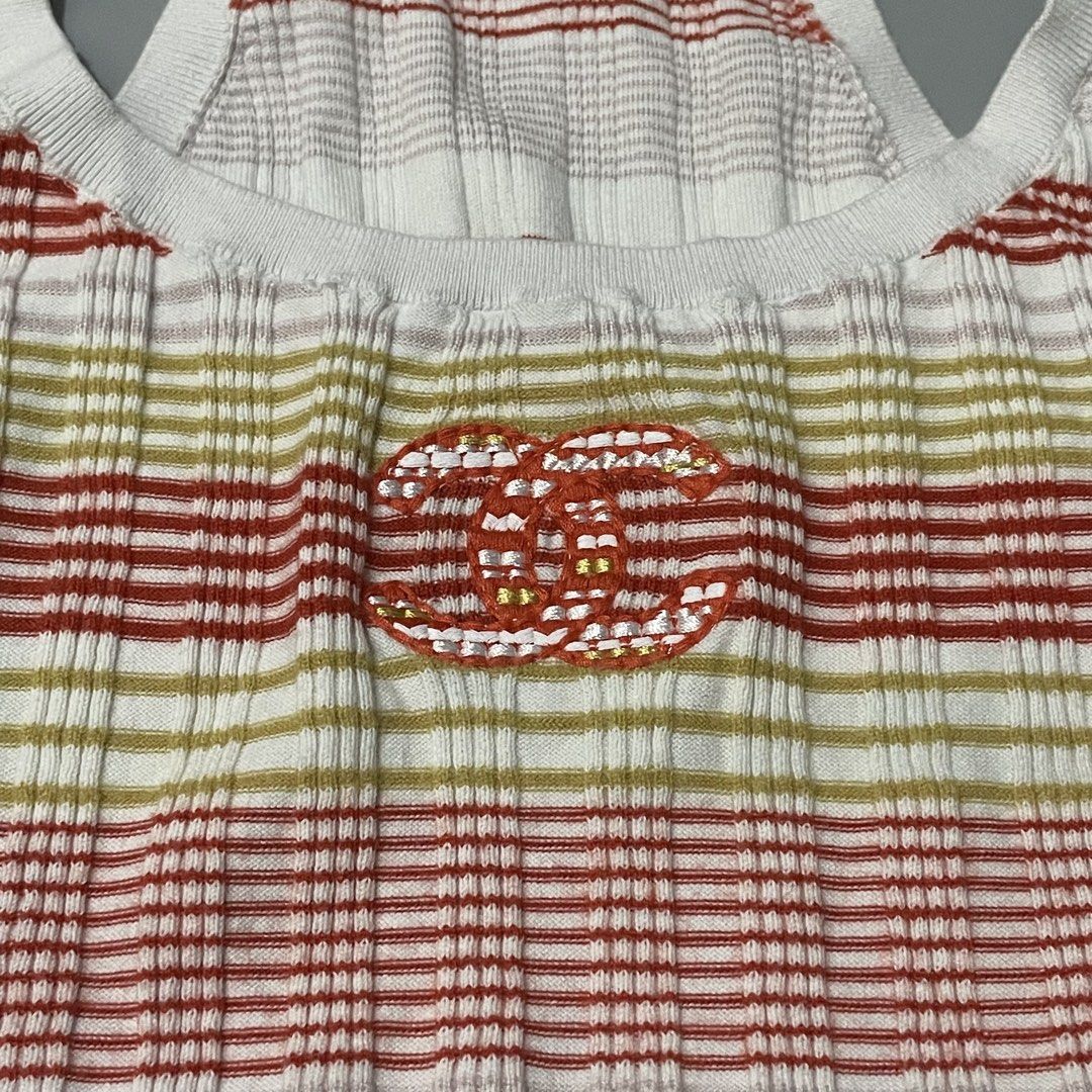 Chanel Knit Striped Tank Top (Category: Sleeveless) located in Manila. Submitted by astral_ (Listing ID 1470104976, Image 3). Description: Chanel Knit Striped Tank Top Size: 38 Condition: 10/10 Issue: None Dimes Width: 15 in Length: 19 in Price: 1,500 shipped.