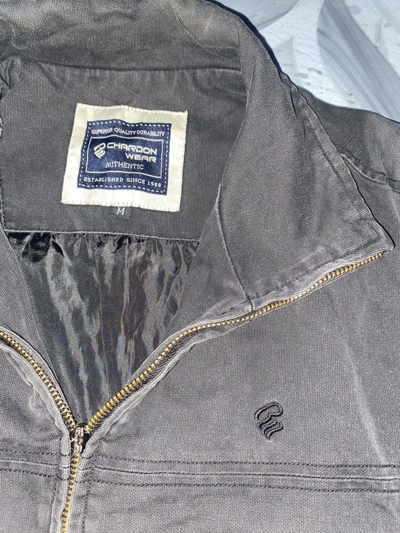 Chardon Wear Dark Grey Jacket Size M (Category: Coats, Jackets and Outerwear) located in Manila. Submitted by boooooos (Listing ID 1469960592, Image 3). Description: - Brand: Chardon Wear (Rocawear) - Color/Material: Dark grey canvas with quilted nylon interior lining - Closure: Full front zip and metallic zipper with branded cuff buttons DM for more details!.