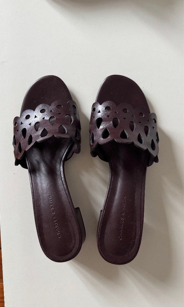 Charles & Keith Cut-Out Block-Heel Mules Maroon Size 38 (Category: Heels) located in Manila. Submitted by harleyy1230 (Listing ID 1470017492, Image 2). Description: -used a few times lang - rarely use it bc it hurts my pinky toe lol.