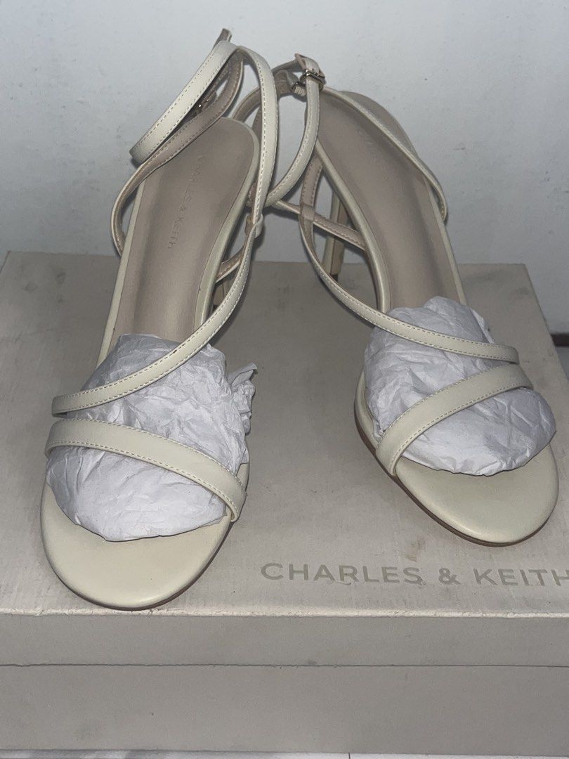 Charles and Keith Sandals (Category: Sandals) located in Manila. Submitted by dzaddykantoothmokodzaddy (Listing ID 1469994325, Image 1). Description: Selling this shoes for 2,500 peso. Negotiable for sure buyer. Used only once during graduation. Size 38 Loc: Quezon City.