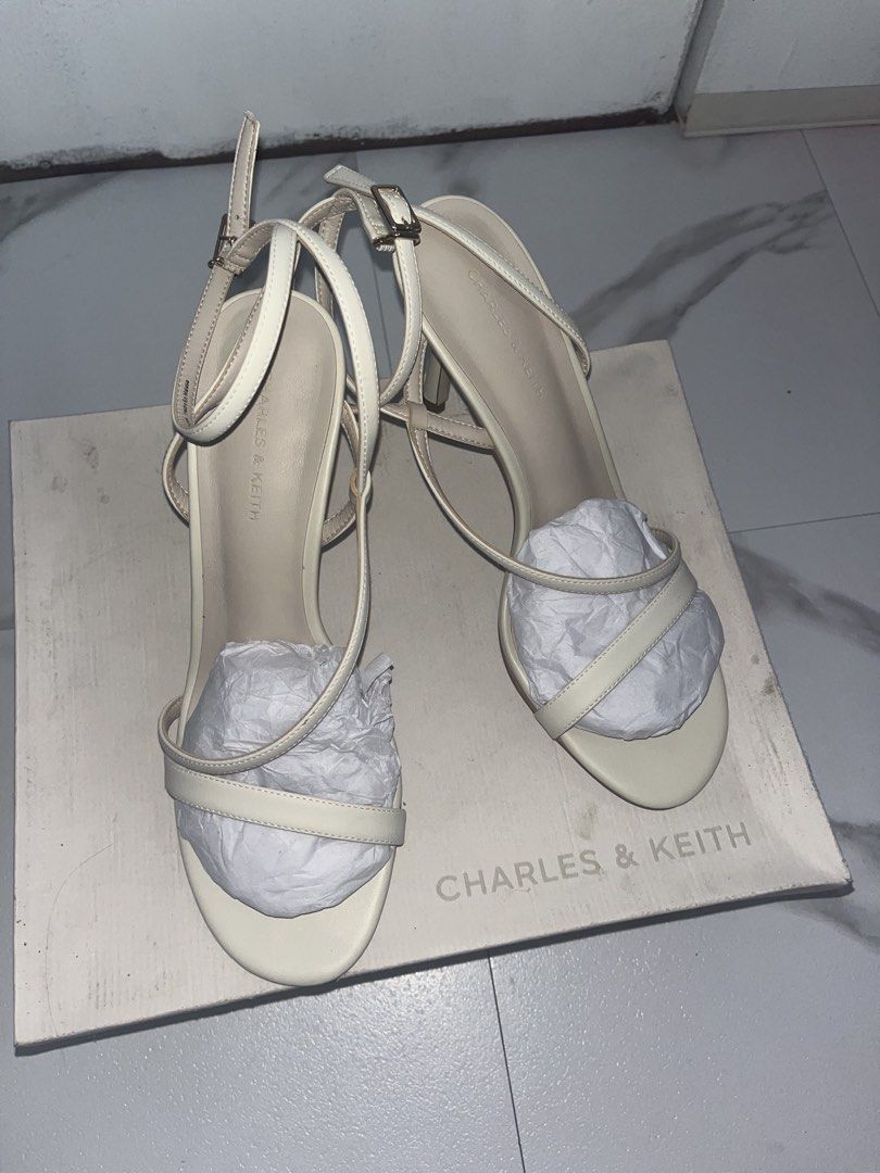 Charles and Keith Sandals (Category: Sandals) located in Manila. Submitted by dzaddykantoothmokodzaddy (Listing ID 1469994325, Image 2). Description: Selling this shoes for 2,500 peso. Negotiable for sure buyer. Used only once during graduation. Size 38 Loc: Quezon City.