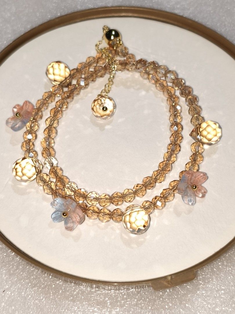 Charming Crystal Beaded Bracelets with Floral Charms (Category: Bracelets) located in Caloocan City. Submitted by books_and_beads (Listing ID 1470083279, Image 3). Description: - Beaded bracelets featuring faceted crystals and floral charms - Includes a gold-tone chain extension with a dangling crystal accent - Adjustable fit for comfortable wear - Available in 4 gorgeous colorways: champagne gold, black, dark multi, and iridescent crystal: · Top