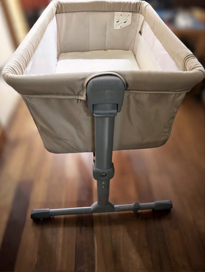 Chicco Next2Me Essential Dune Re-Lux Bedside Crib (COMPLETE) (Category: Cots & Cribs) located in Manila. Submitted by prelovedbyarielle (Listing ID 1469978628, Image 2). Description: Selling Chicco Next2Me Essential bedside crib in very good condition. Perfect for newborns, ideal for safe co-sleeping and easy night feeding. (NEGOTIABLE) ✔ Adjustable height levels ✔ Breathable mesh sides ✔ Side panel opens for bedside use ✔ Incline option for refl