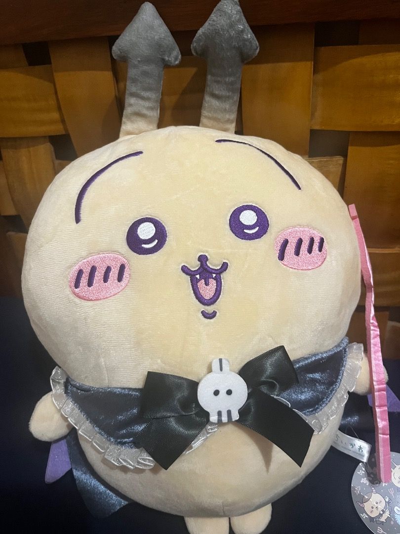 Chiikawa Usagi Halloween Devil Plush (Category: Plushies & Soft Toys) located in Tarlac. Submitted by theoshawott_adventureph (Listing ID 1470124508, Image 1). Description: - Authentic Chiikawa Halloween Series Kurimanju plush - Original tag still attached (Brand New) - Features a black cape, skull-embellished bow, grey horns, and a pink pitchfork - Made with super soft, huggable material - Perfect for gifts or Chiikawa collectors.