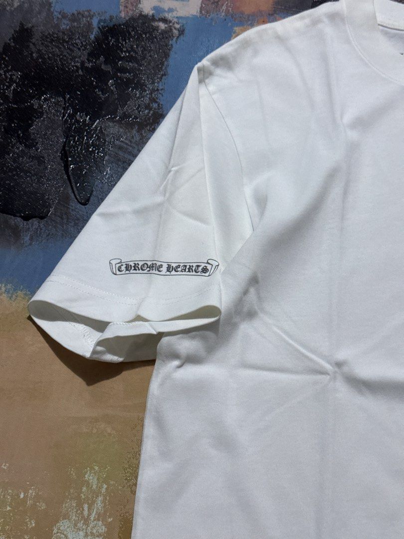 Chrome Hearts pocket tee (Category: Tshirts & Polo Shirts ) located in Las Pinas. Submitted by thrftmnl. (Listing ID 1469963553, Image 3). Description: Chrome hearts pocket tee Size: Small on tag (fits Medium) Dimes Width: 20.5 Length: 27.5 Issue: none.