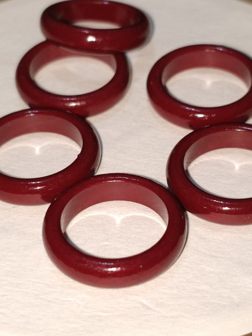 Cinnabar Bangle Ring Size 17/ US Size 7 (Category: Rings) located in Caloocan City. Submitted by books_and_beads (Listing ID 1470089533, Image 1). Description: A beautiful set of solid cinnabar band rings in a rich, glossy oxblood red. These smooth, minimalist rings feature the classic deep crimson hue associated with traditional cinnabar, in a sleek, seamless band. Perfect for stacking, wearing as a bold statement piece, or gifting for good luck