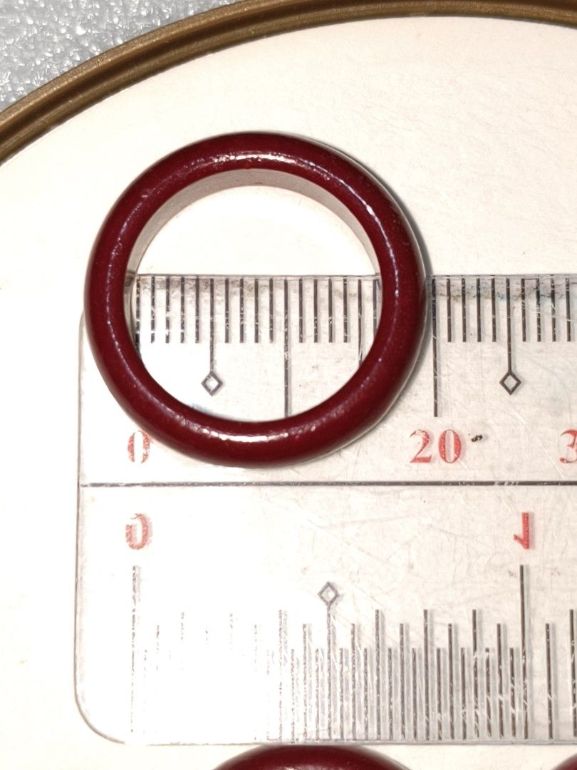 Cinnabar Bangle Ring Size 17/ US Size 7 (Category: Rings) located in Caloocan City. Submitted by books_and_beads (Listing ID 1470089533, Image 2). Description: A beautiful set of solid cinnabar band rings in a rich, glossy oxblood red. These smooth, minimalist rings feature the classic deep crimson hue associated with traditional cinnabar, in a sleek, seamless band. Perfect for stacking, wearing as a bold statement piece, or gifting for good luck
