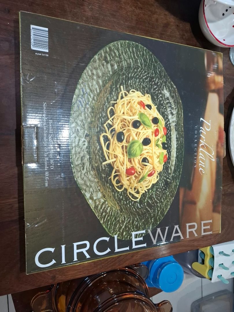 CIRCLEWARE Parklane Glass Serving Tray 16 Inches (Category: Dinnerware & Cutlery) located in Pasig City. Submitted by dripcounty (Listing ID 1470024974, Image 2). Description: CIRCLEWARE Parklane Glass Serving Tray 16 Inches ₱400 Bought in the Philippines Condition: New / unused Circleware Parklane Collection textured round serving tray, 16 inches / 40.6 cm diameter. Unused, with box. Price is for one tray; second photo shows its packaging. Actua